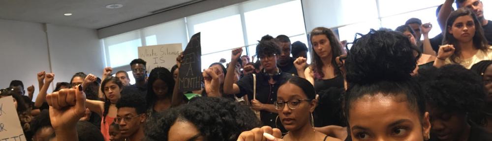 Black Students United silently protested at the University Assembly meeting on Tuesday. CREDIT: LAURA ROSBROW-TELEM